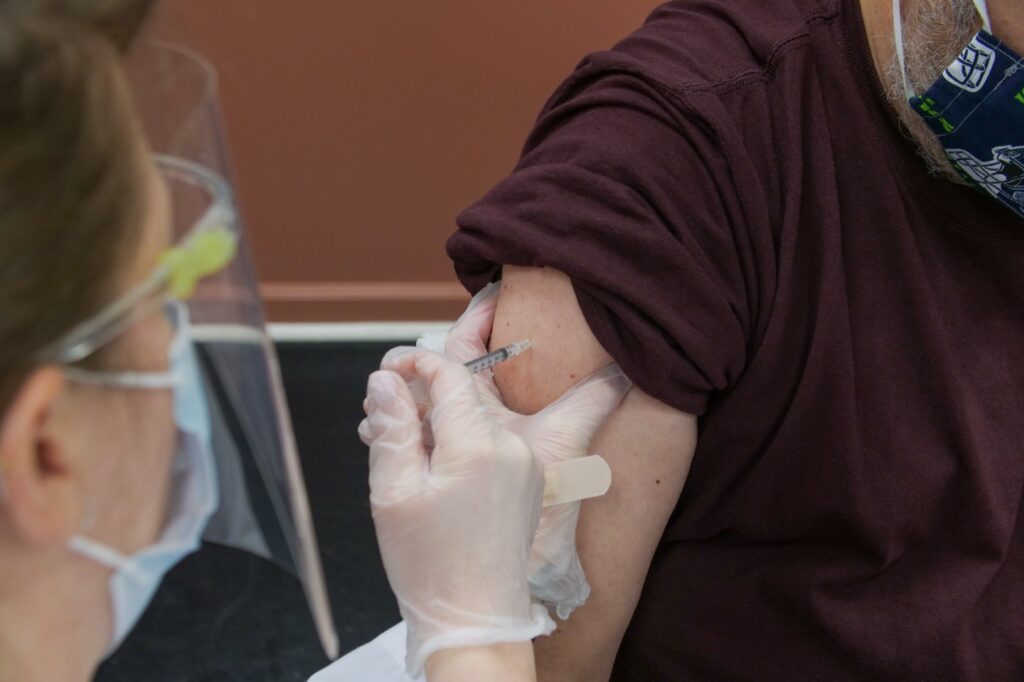 Man receiving an injection